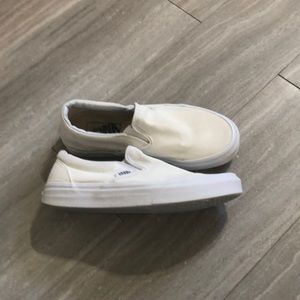 white slip on vans